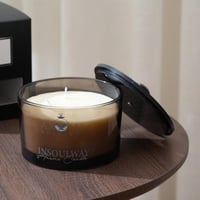 شمعة بتصميم مميز بكأس زجاجي باللون الاسود