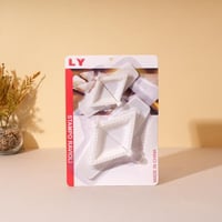 مجموعة قوالب مثلثة باحجام مختلفة لتشكيل العجين بال...