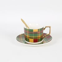 فنجان قهوة مخطط أخضر من البورسلين مع صحن و ملعقة