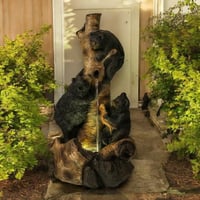 نافورة شكل دببة مع سمك فوق شجرة لون بني و اسود مقا...