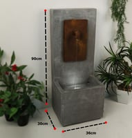 نافورة علي شكل صنبور للمياه باللون الرمادي / البني...