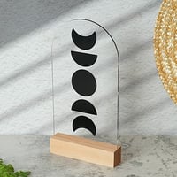 ستاند اكريلك بتصميم مراحل نمو الهلال بقاعدة خشبية...