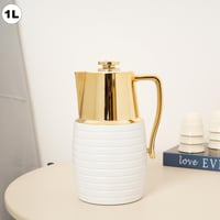 ترمس الشاي والقهوة بتصميم عصري باللون الابيض والذه...