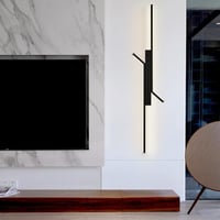 إضاءة حائط بلون انارة اصفر بتصميم مميز لون اسود