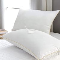 وسادة سرير لون أبيض بخط ذهبي مقاس 90x50x15 سم