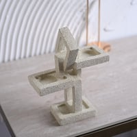 شمعدان بتصميم متشابك باللون البيج مقاس 24 سم