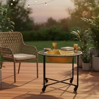 منقل ديكور دائري بلون ذهبي وأسود فاخر مع عجلات