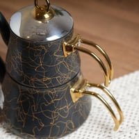 طقم ابريق شاي بتصميم عصري لون اسود وذهبي مقاس 27x2...