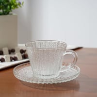 كوب شاي زجاجي مطفي مع صحن تقديم