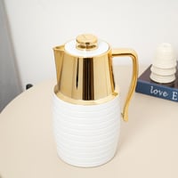 ترمس الشاي والقهوة بتصميم عصري باللون الابيض والذه...