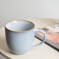 كوب سيراميك أنيق بلون أزرق متدرج – ارتفاع 9 سم