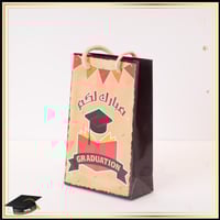 حقيبة توزيعات التخرج بعبارة (مبارك التخرج) لون احم...