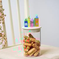 برطمان زجاج بغطاء مزخرف للتقديم والتخزين