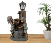 نافورة مياه مضيئة علي شكل منزل وصنبور مزين بالاطفا...