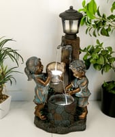 نافورة مياه مضيئة علي شكل منزل وصنبور مزين بالاطفا...