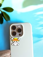 ستيكر لاصق معدني للجوال - بتصميم جمجمة لوفي