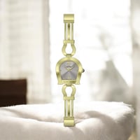 ساعة نسائية موديل اقنر ذهبي ميناء رمادي