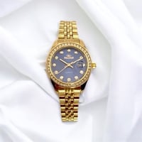 ساعه نسائيه موديل رولكس ذهبي ميناء ازرق