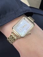 ساعه نسائيه ماركه بروشا مستطيل ذهبي ميناء فضي ارقا...