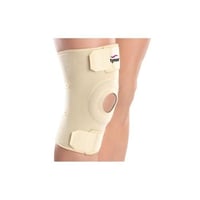 لف الركبة تاينور (نيوبرين}. كود J-05.