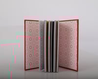 مصحف جلد أجزاء ملونة