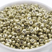 خرز حروف بلاستيك ذهبي