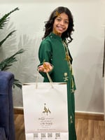 دقله اليوم الوطني مع وشاح بالاسم