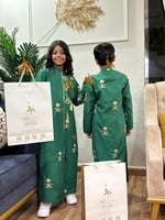 دقله اليوم الوطني مع وشاح بالاسم