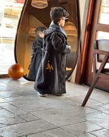 فروه اطفال بالاسم قماش جوخ مع جلد على الاطراف