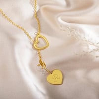 سلسال حرف على قلب _ يرتبط بقلب مفرغ تصميم جميل