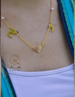 سلسال رقبة بتصميم قلب واللؤلؤ