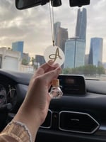 تعليقة سيارة بالاسم