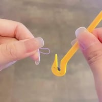 قاطعة اربطة شعر للاطفال المطاطية ( بدون الم)