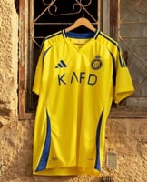 تيشيرت النصر الأساسي 2025