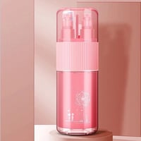 منظم فرشاة ومعجون مع مستلزمات لون وردي