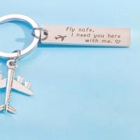 ميدالية مفاتيح مع طائرة