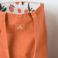 حقيبة كتف نسائية كبيرة بوجهين للتسوق لون برتقالي