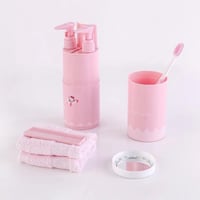 منظم فرشاة ومعجون مع مستلزمات لون وردي