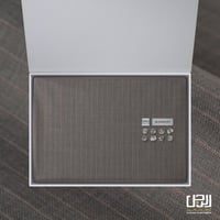 قماش جيفنشي شتوي بني فاتح مقلم