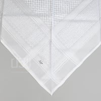 شماغ دسار الابيض بلس 2025