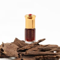 علبة من العود صنفي كلمتان الطبيعي ودهن العود الكمب...