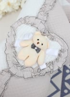 بطانية ومدس مواليد مع شريط مربوط