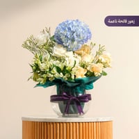 اصنعي ألبوم زفافك مع باقة ورد فاخرة