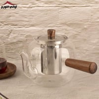 أبريق زجاج بيد خشب