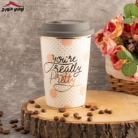 كوب سيراميك بغطاء سيلكون أبيض منقط