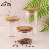 حافظة زجاج دائري بغطاء خشب بالحبه