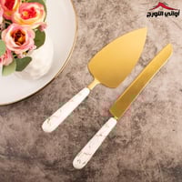 ملعقة كيك مع سكين ماربل أبيض مذهب