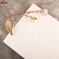 تبسي رخام مستطيل بيد زنبقة ذهبي