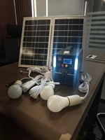 جهاز متنقل بالطاقة الشمسية مع 4 لمبات ووصلة شواحن...