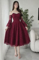 فستان دانتيل فاخر بطبقات وأكمام جرس للعيد 2026